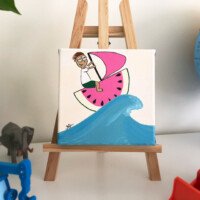Playful cartoon illustration of a smiling boy with glasses windsurfing on a pink watermelon-slice board with a pink sail, riding a blue wave.